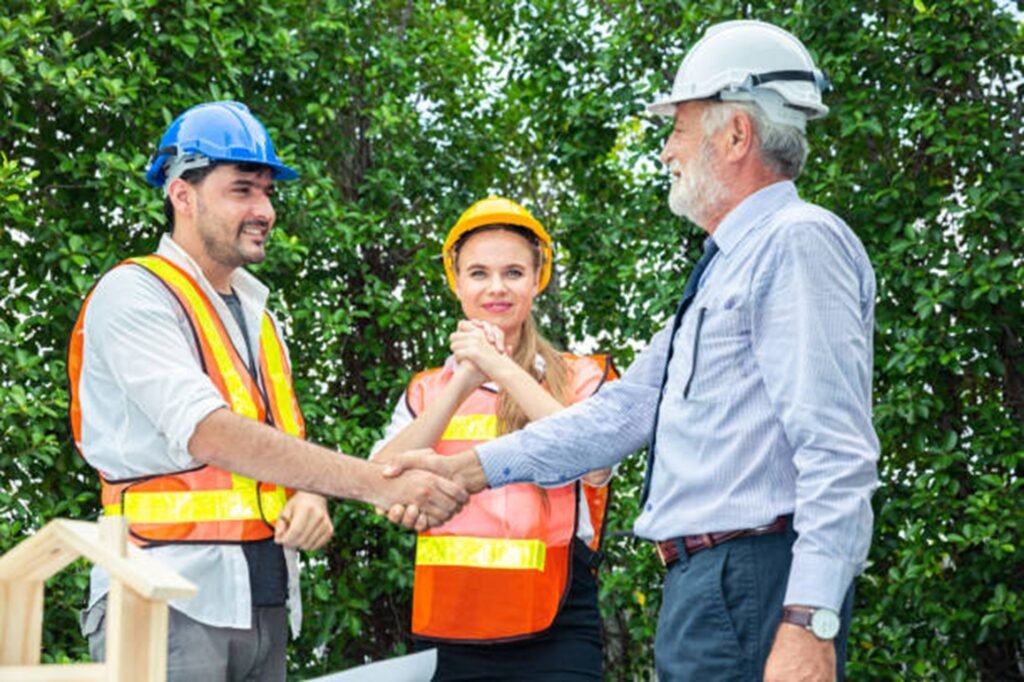 Tree trimming and pruning service in Fairlawn with a professional crew carefully cutting tree branches near a residential property.